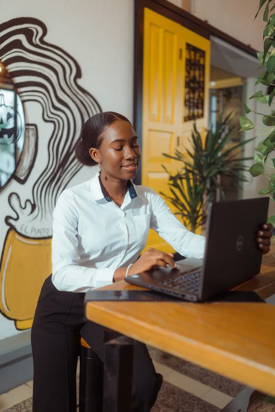 A business owner working on her laptop